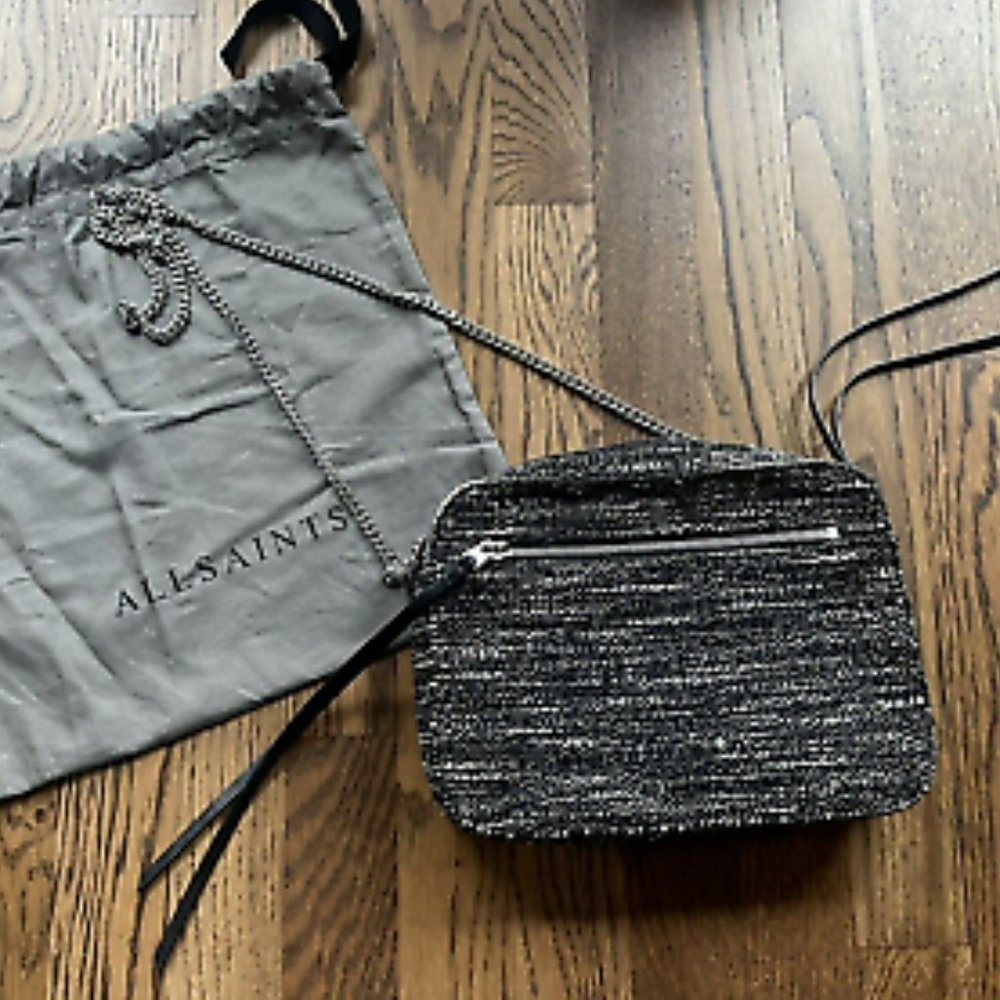 - - - All saints purse capt euc!